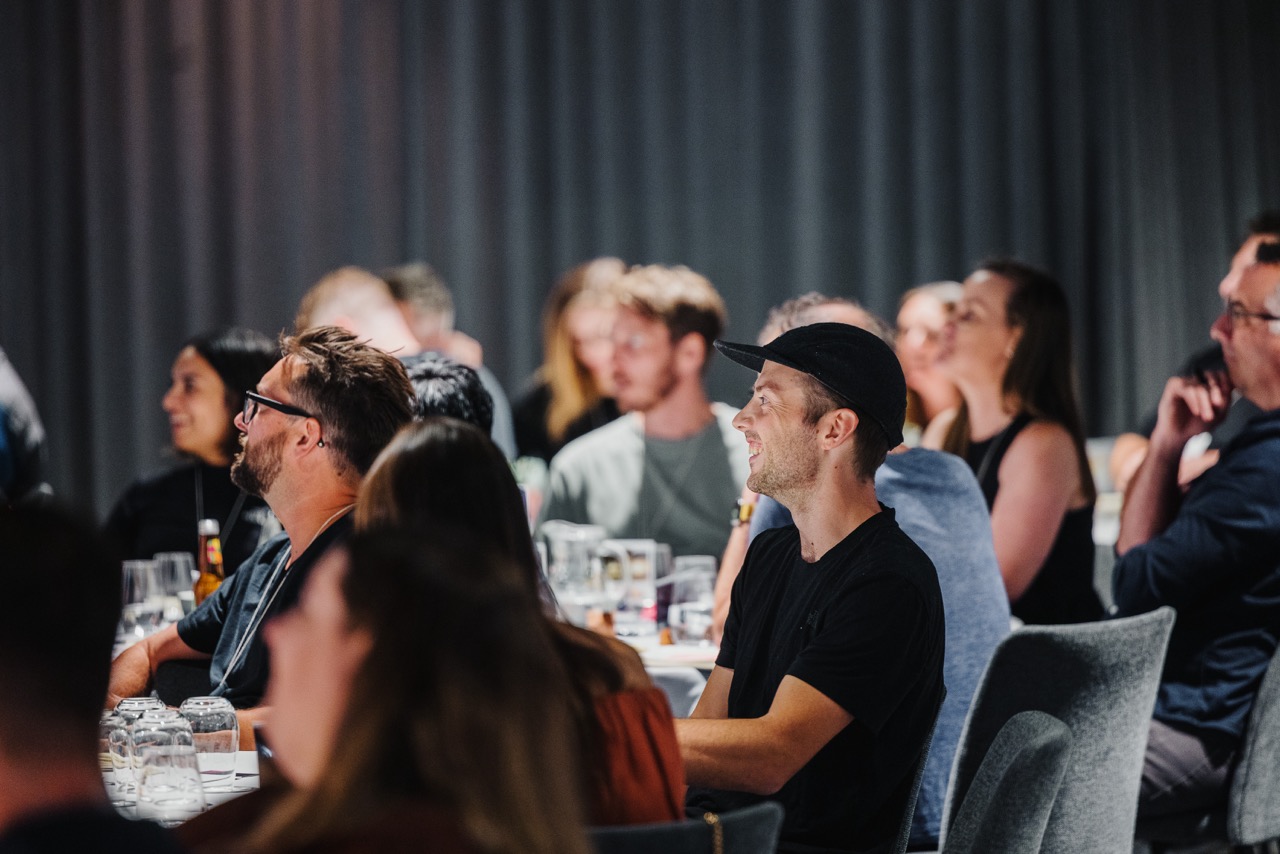 A photograph of attendees at DO Design Leadership