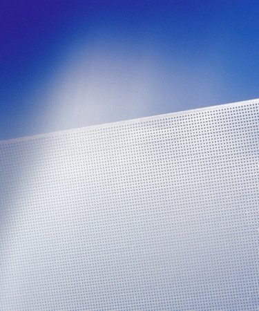 A metallic surface with a grid-like texture, set against a gradient blue sky. The pattern creates a clean and modern look